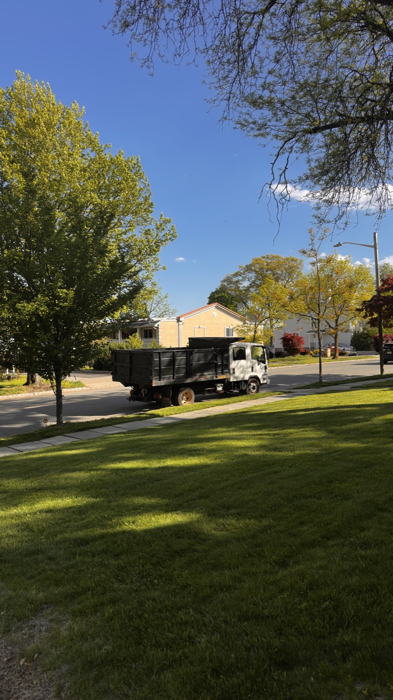 Lawn and Power Pro dump truck loaded for debris removal
